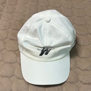 Cream Baseball Cap with Distressed Black Logo